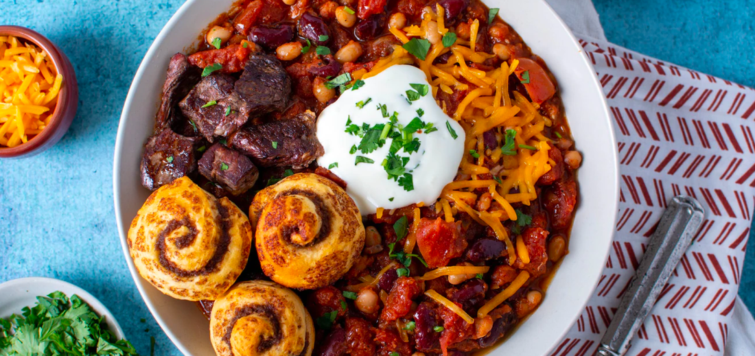 Nebraska chili with three mini cinnamon rolls