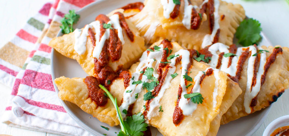 Suffed and Smothered Sopapillas with multi colored striped napkin