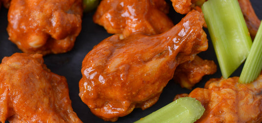 Buffalo wings with celery sticks