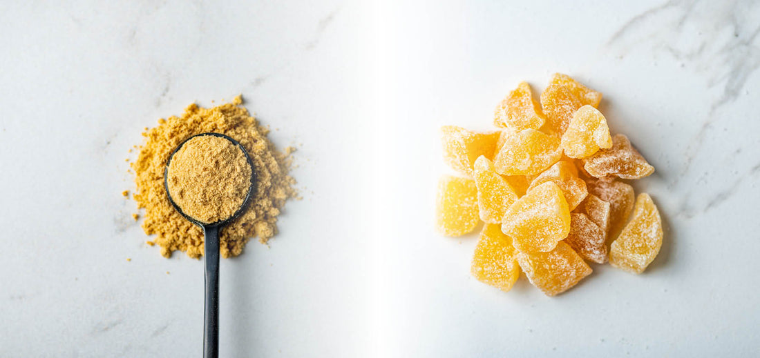 Spoon of ground ginger on the left and crystallized ginger on the right