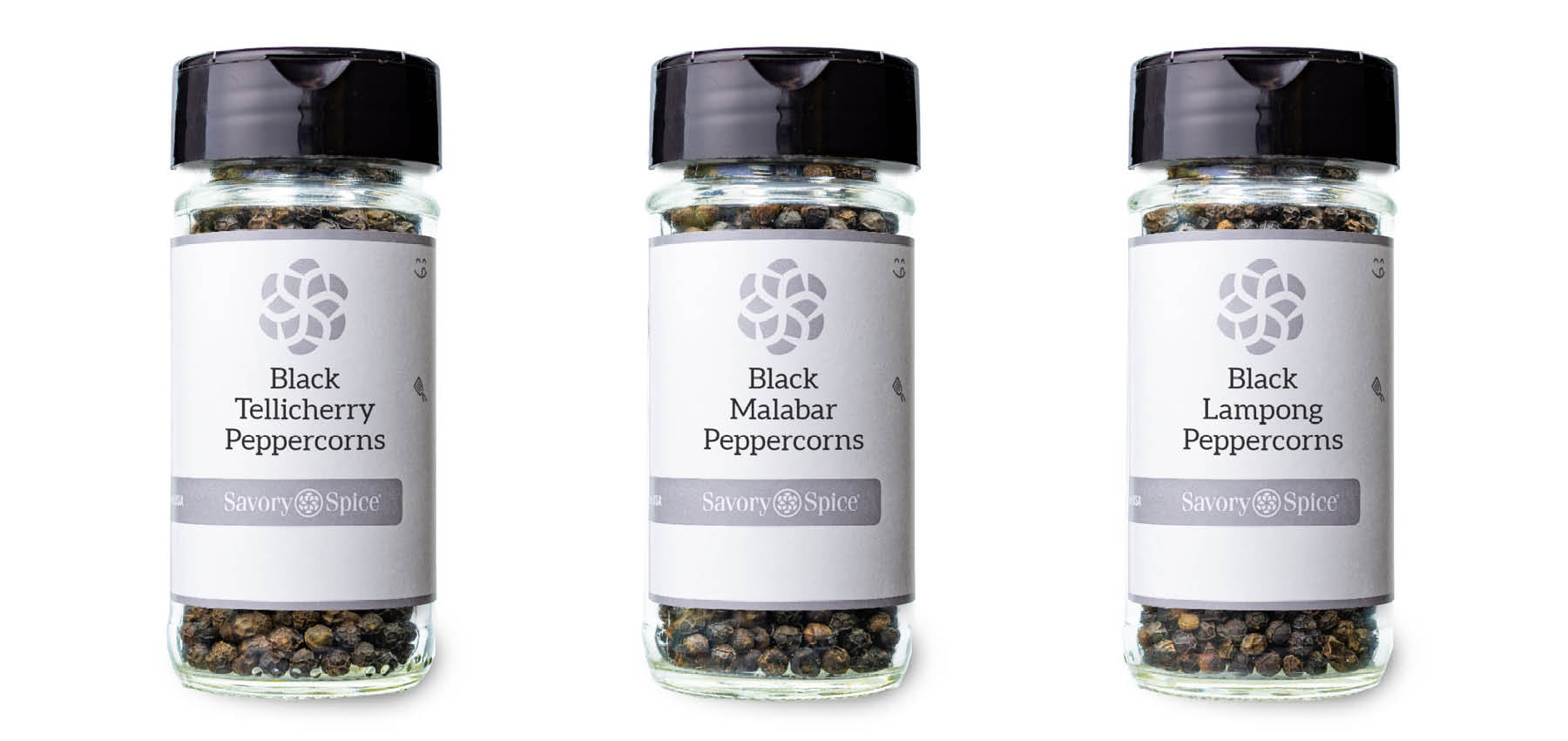 Jars of Black Tellicherry, Malabar, and Lampong Peppercorns