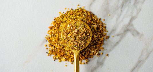 Close up of Pyramid Peak Lemon Pepper in a gold spoon