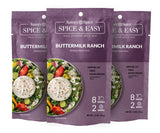 Three packets of Buttermilk Ranch on white