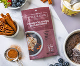 Cinnamon Spiced Mug Brownie Spice & Easy Package, overhead image with ice cream, cinnamon sticks, afresh fruit, and the finished mug brownie.