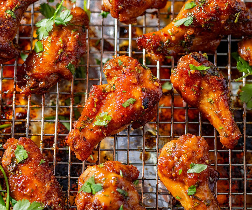 Chicken wings with herbs and a caramel glaze.