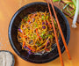 Spiced Lo Mein with sesame seeds and chopsticks