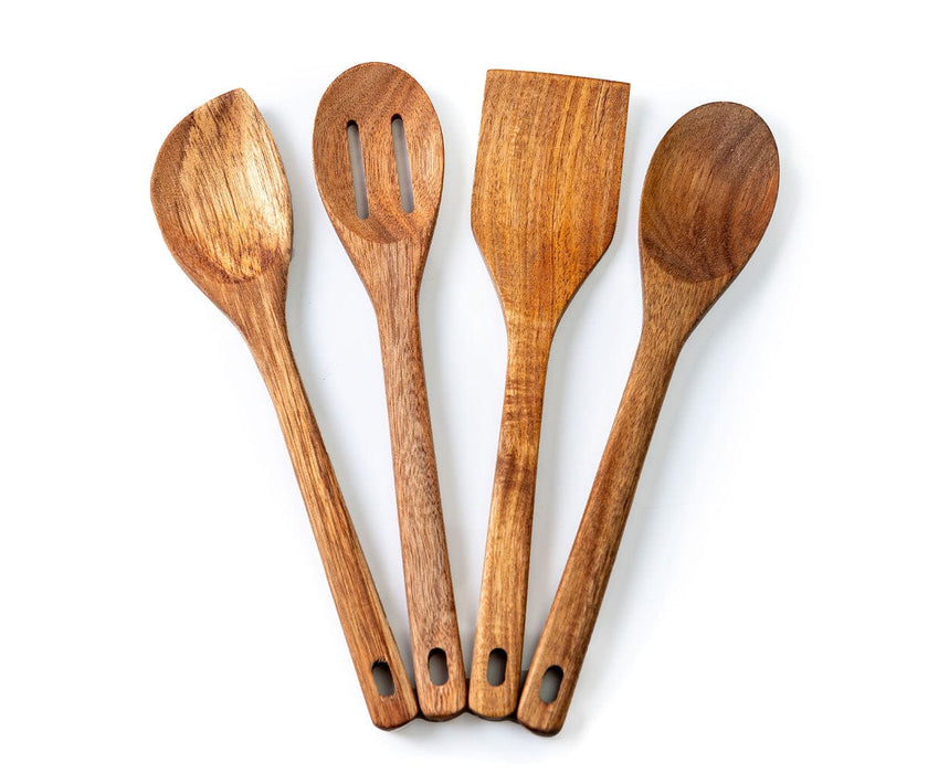 Four wooden cooking utensils fanned out